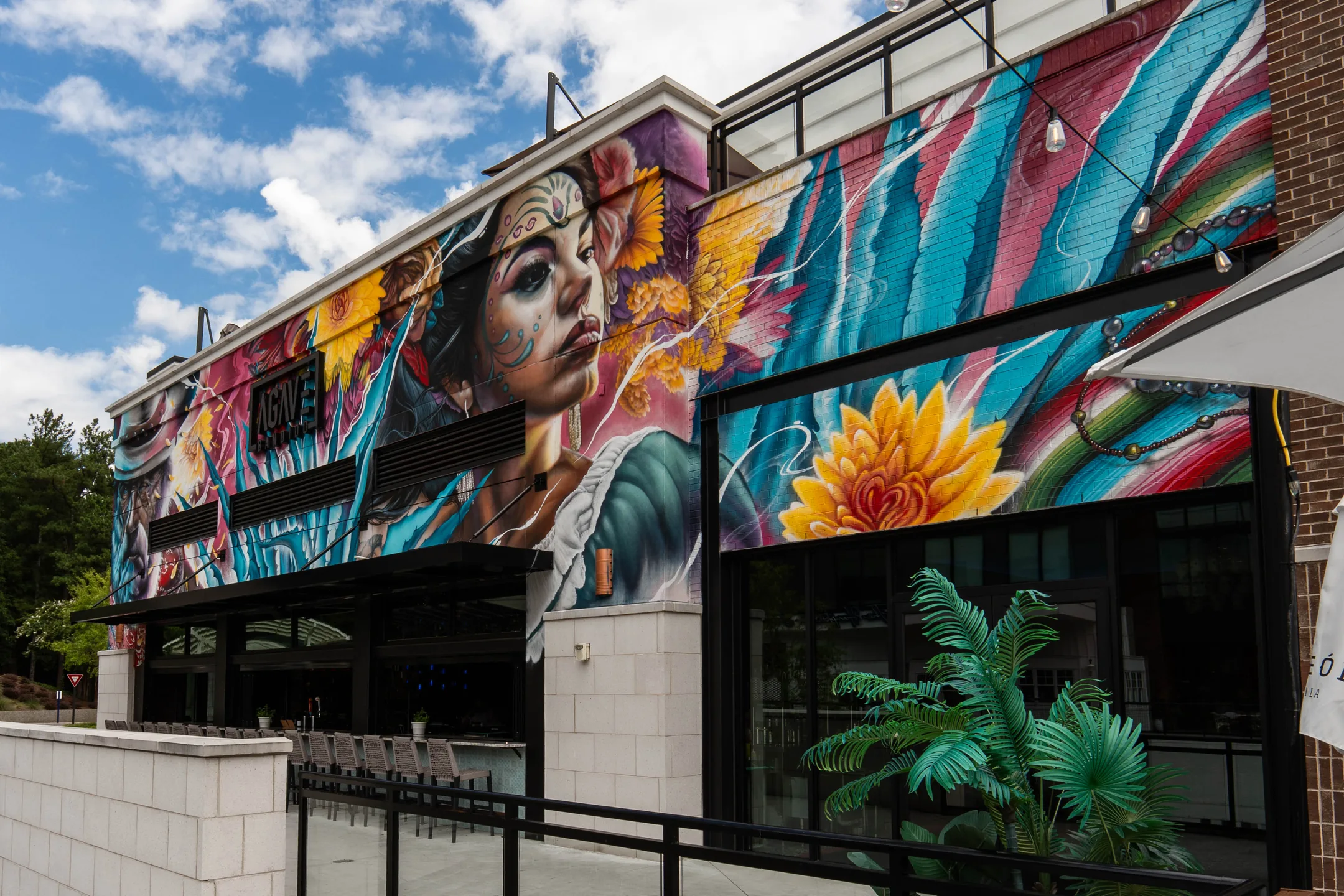 The Agave Bandido storefront, with its painted mural